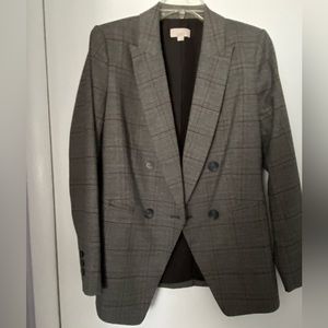 Fully lined, machine washable double-breasted fall blazer in plaid.